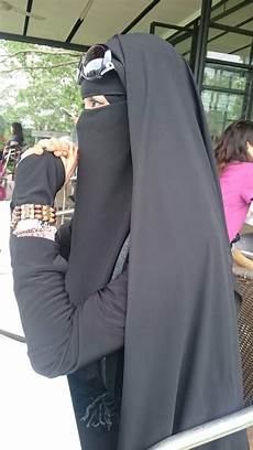 Veiled Woman Dresses
